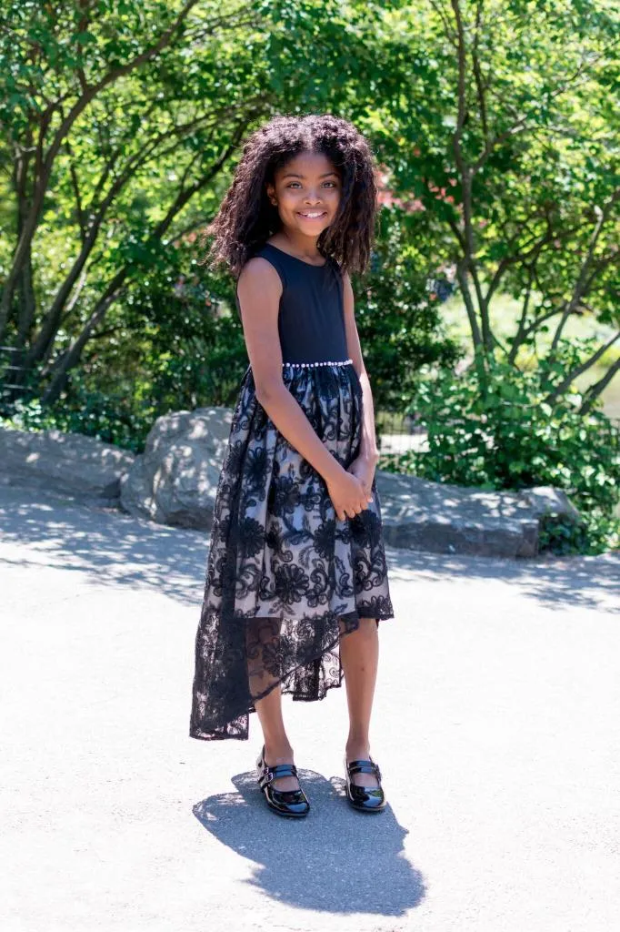 Bonnie Jean Sleeveless Black Dress with Velvet Bodice and Lace Overlay Hi-Low Skirt